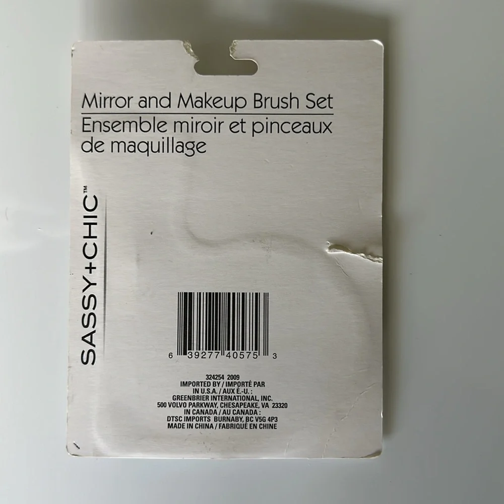 Mirror and makeup brush set